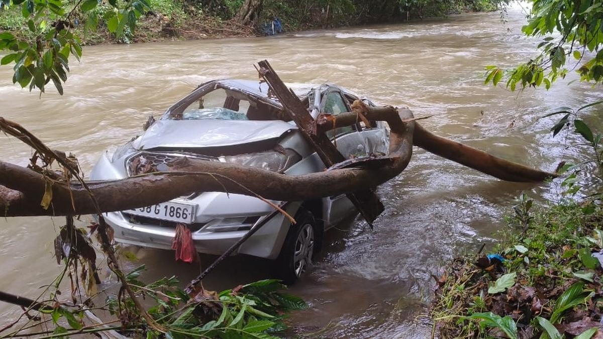 Narrow escape for priest as car swept away in floodwaters