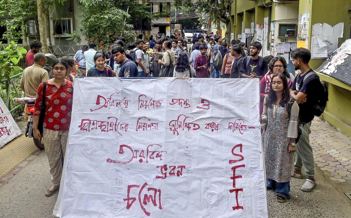 Students under SFI banner protest on the Jadavpur University campus demanding immediate investigation into recent tragic incidents on the campus. Students under SFI banner protest on the Jadavpur University campus demanding immediate investigation into recent tragic incidents on the campus.