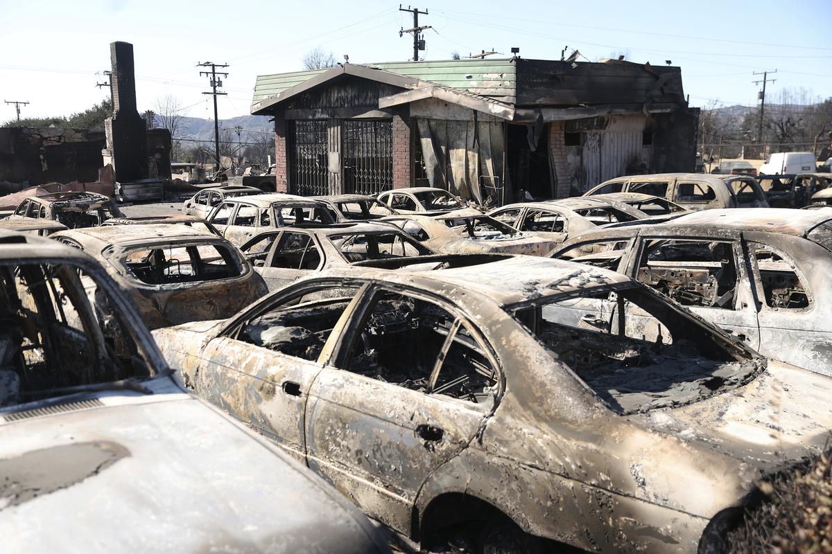 A lot is full of burned out vehicles after the Eaton Fire in Altadena, California, on January 13, 2025