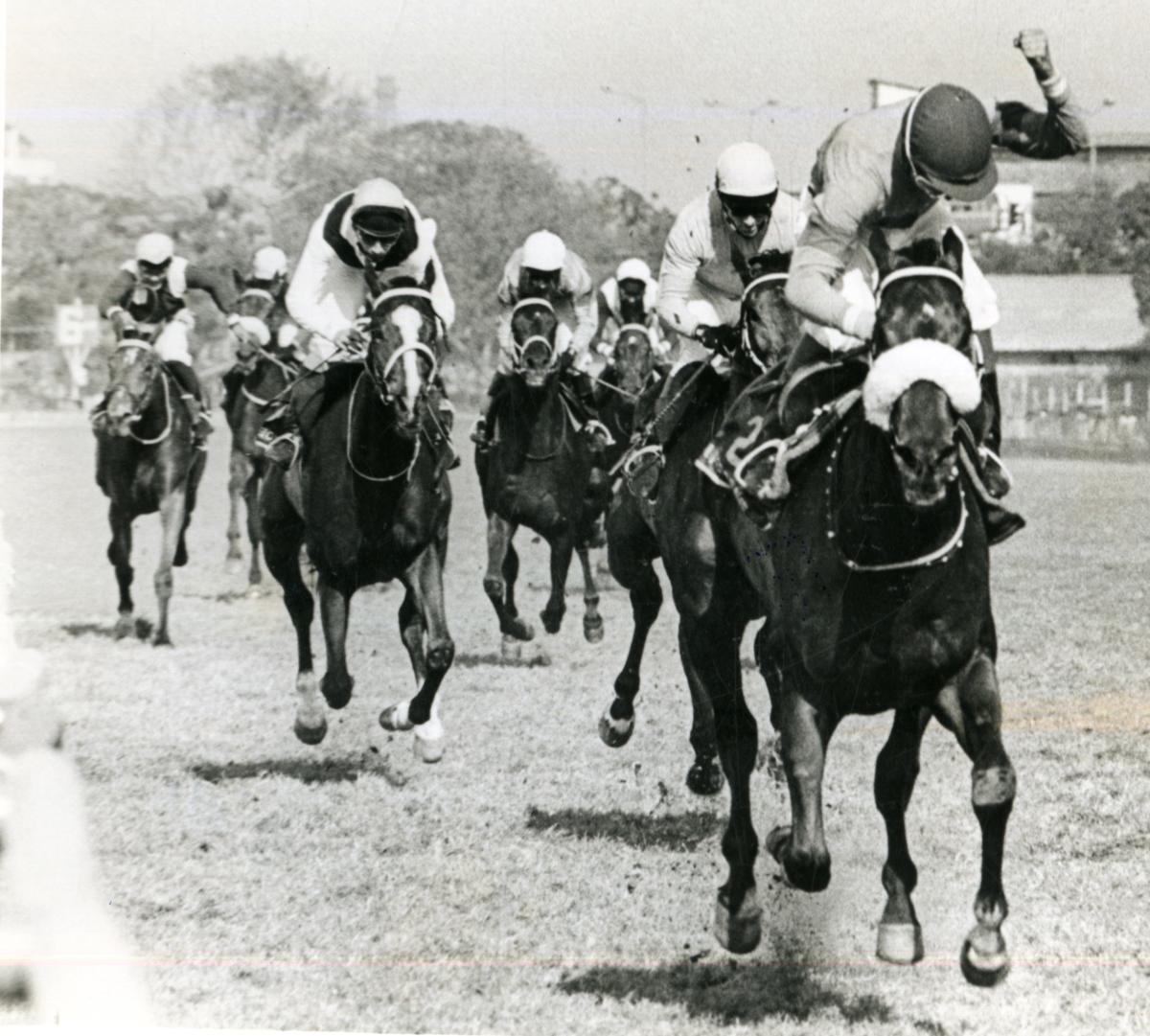 Jockey Aslam Kader celebrates his first Invitation Cup triumph on Super Brave with a clenched fist in Bombay on March 06, 1994. Jockey Aslam Kader celebrates his first Invitation Cup triumph on Super Brave with a clenched fist in Bombay on March 06, 1994.