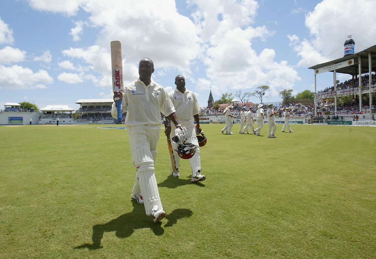 Brian Lara leaves the field after declaring his innings on 400 not out, at the Recreation Ground in St. Johns, Antigua, on April 12, 2004.