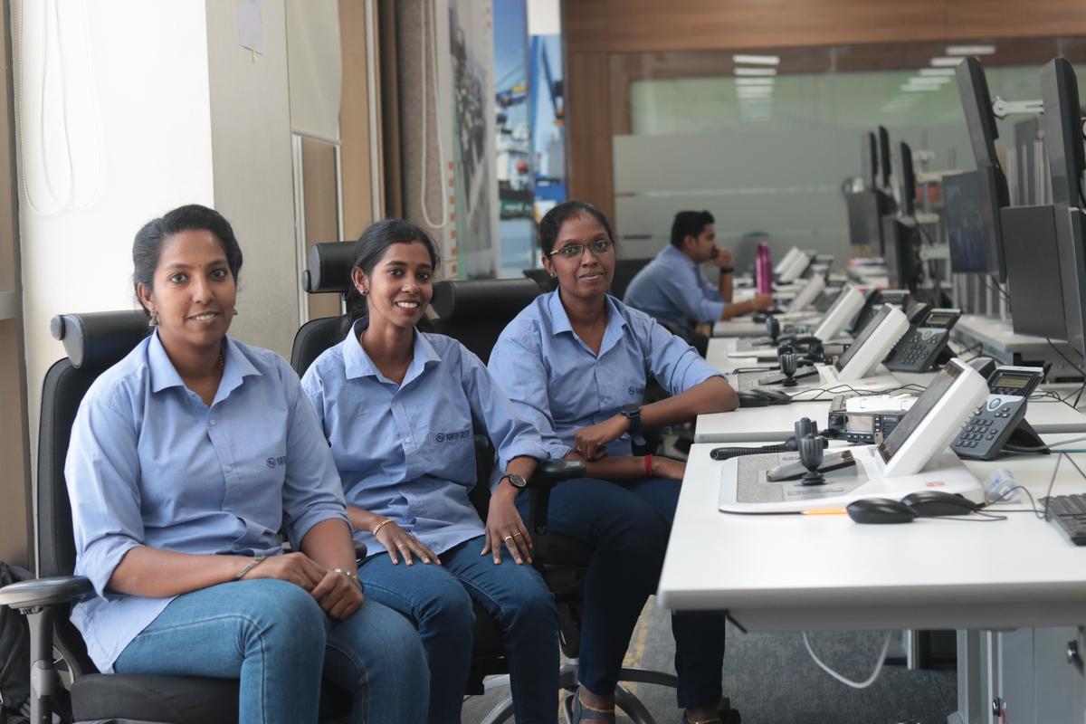 (From left) Steffy Rebeira, Karthika L and Anisha S are among the nine women who operate automated cranes at Vizhinjam international port in Thiruvananthapuram.
