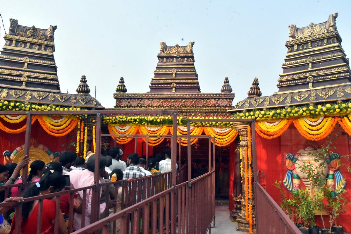 Devotees visit Sri Mahalaxmi Godha Sametha Virat Venkateshwara Swami Temple Vaikuntapuram on the occasion of Vaikuntha Ekadashi in Sangareddy on Friday.