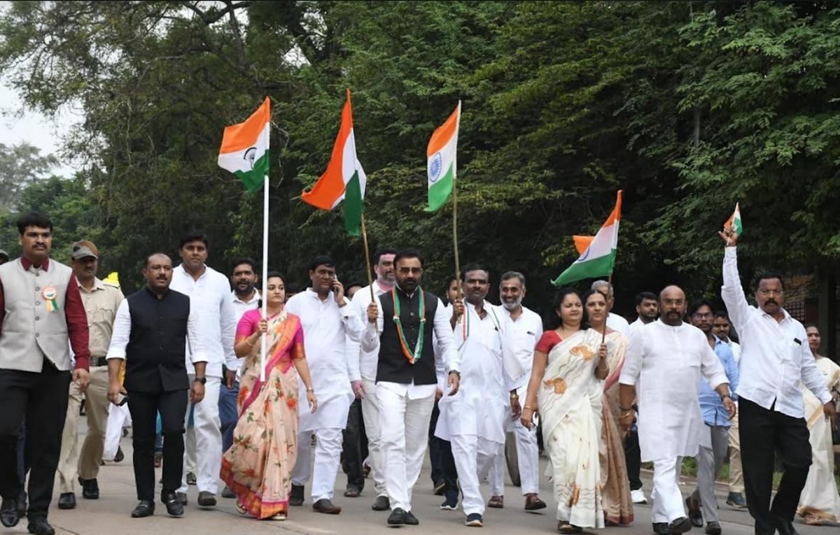 District in-charge Minister Santosh Lad, Deputy Commissioner Divya Prabhu G.R.J. and others taking part in a procession organised as part of Independence Day celebrations in Dharwad on Thursday.