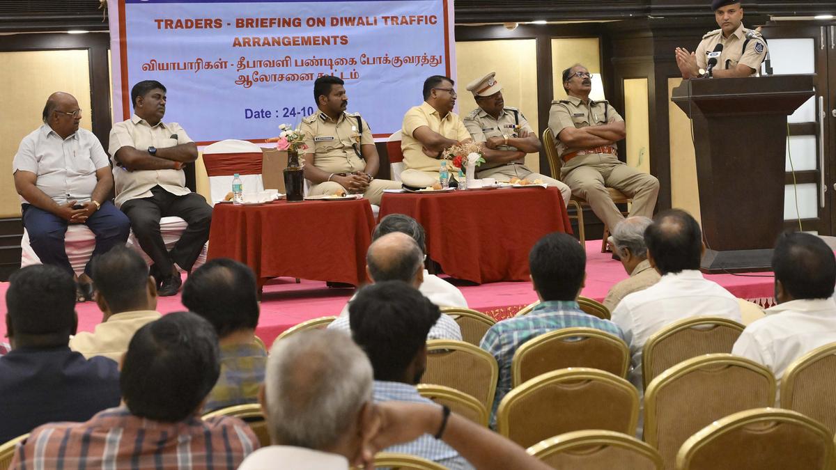 Police hold meeting with traders
