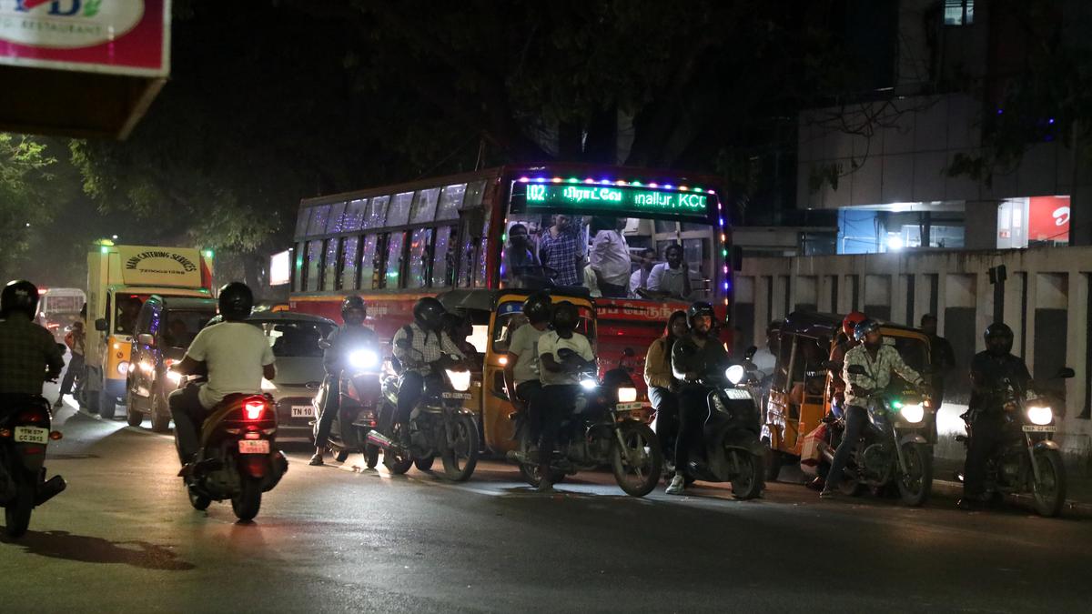 Traffic at a signal on narrow road turns busy during peak hours