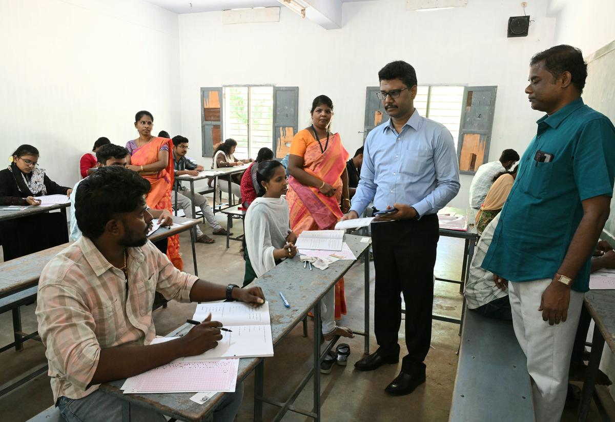 Officials inspect a TNPSC Group-IV examination centre in Thoothukudi on Saturday. 