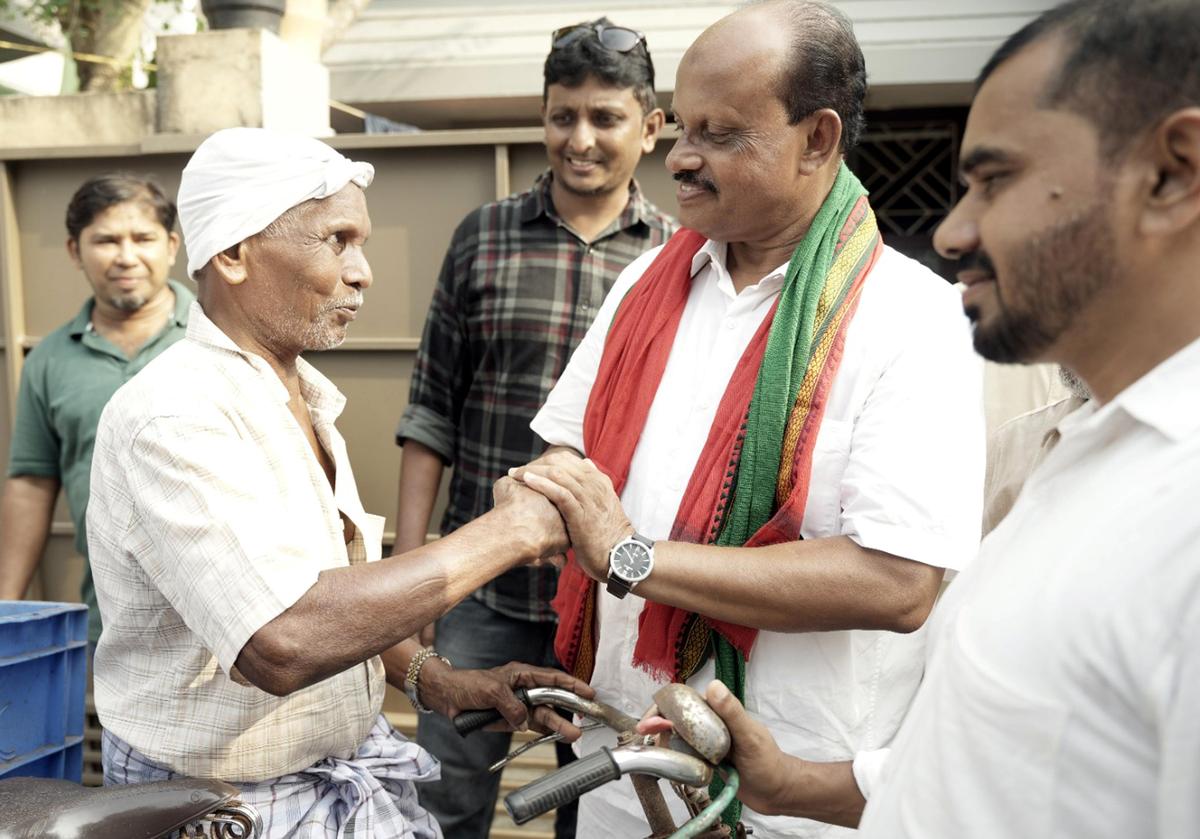 Kozhikode South LDF candidate Ahammad Devarkovil during campaigning.
