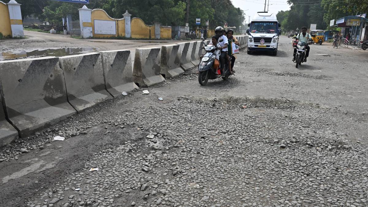The damaged road in front of central prison is a nightmare for vehicle users