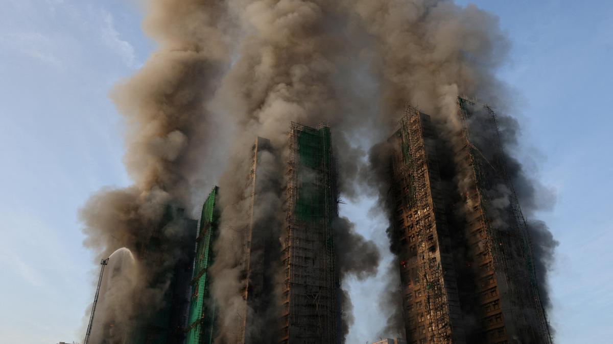 At least four killed as fire rages through bamboo scaffolding at Hong Kong’s high-rise building