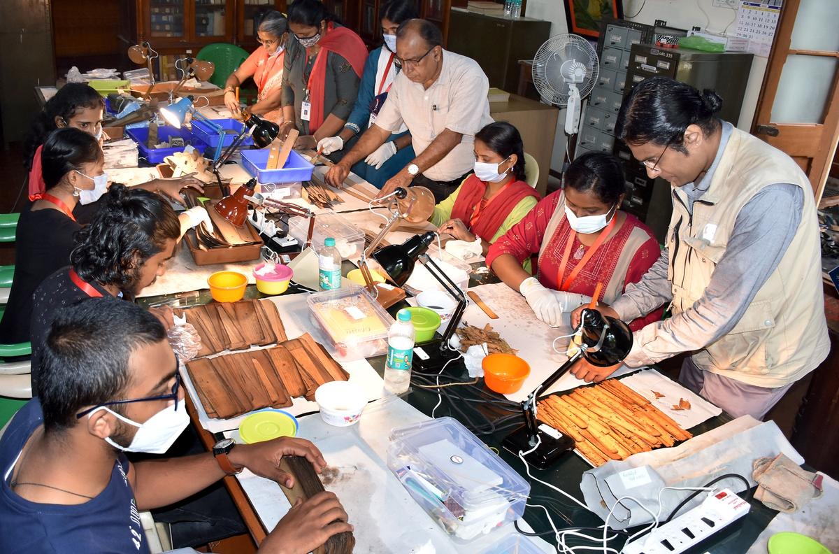 Treatment of palm leaf manuscripts as part of the digitization project at the Oriental Research Institute in Mysuru.