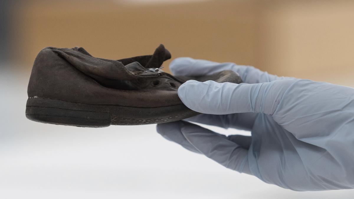 Auschwitz museum begins emotional work of conserving 8,000 shoes of murdered children