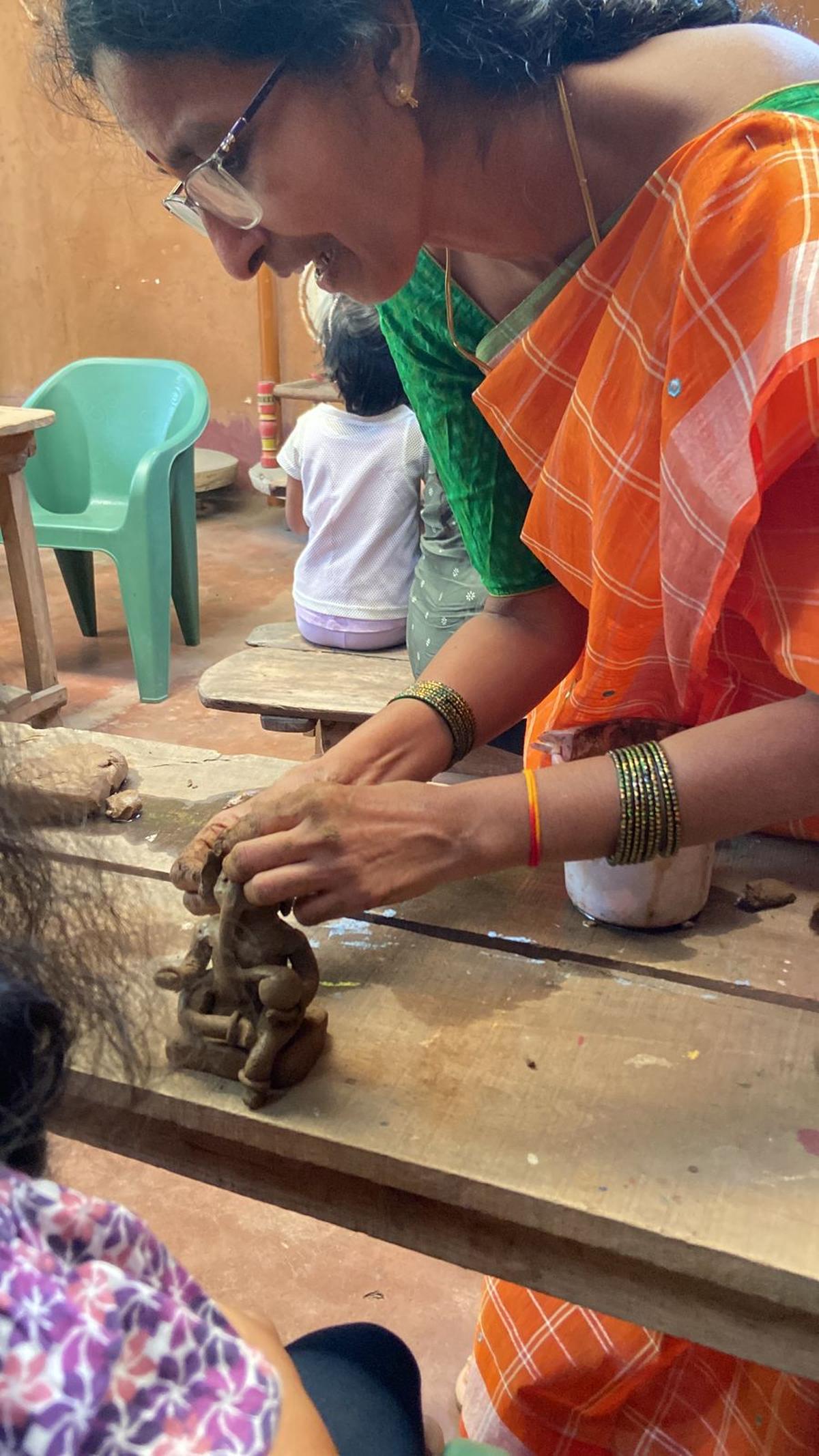 Arunjyothi Lokhanday at a clay Ganesha making workshop