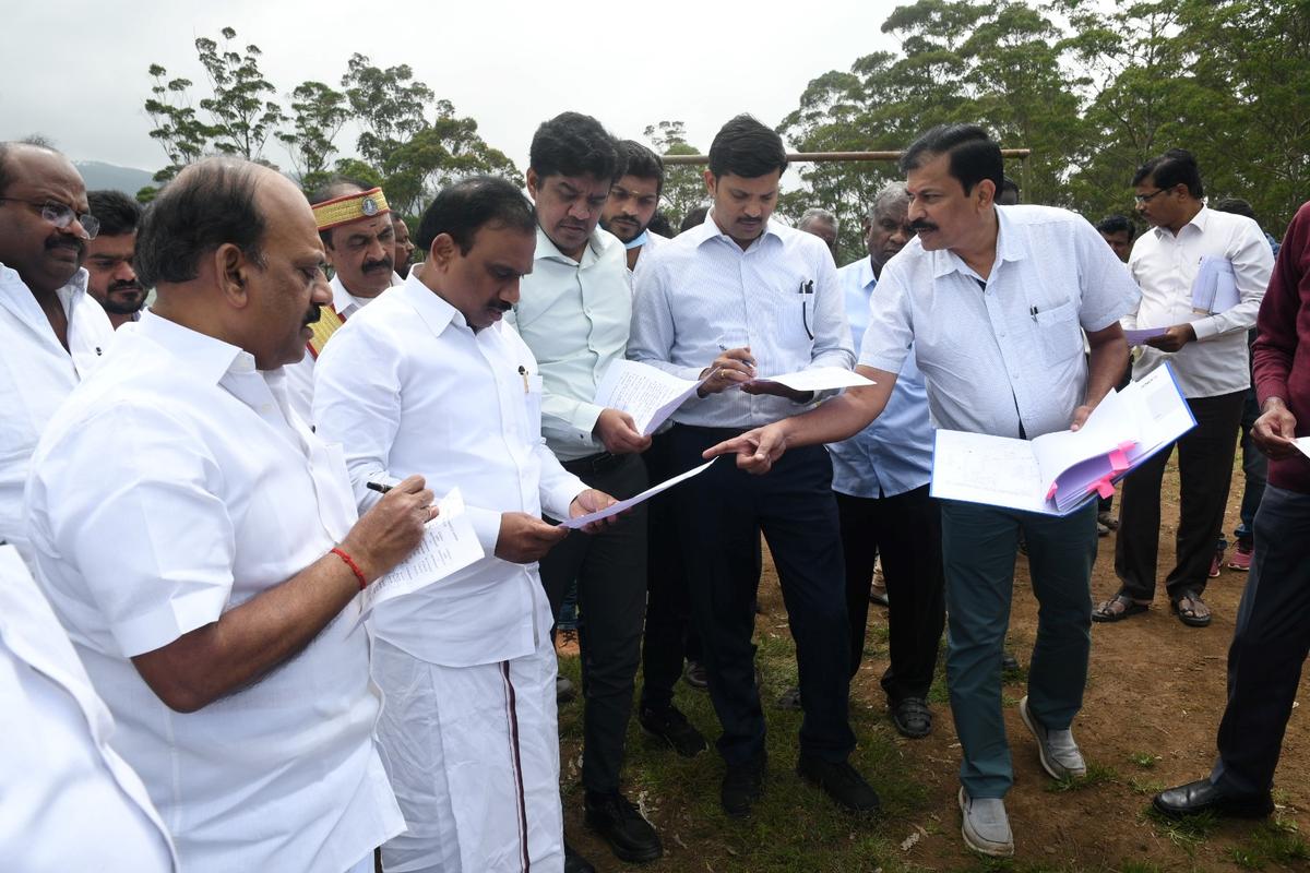 MP, Minister inspect land earmarked for housing retired TANTEA staff in the Nilgiris