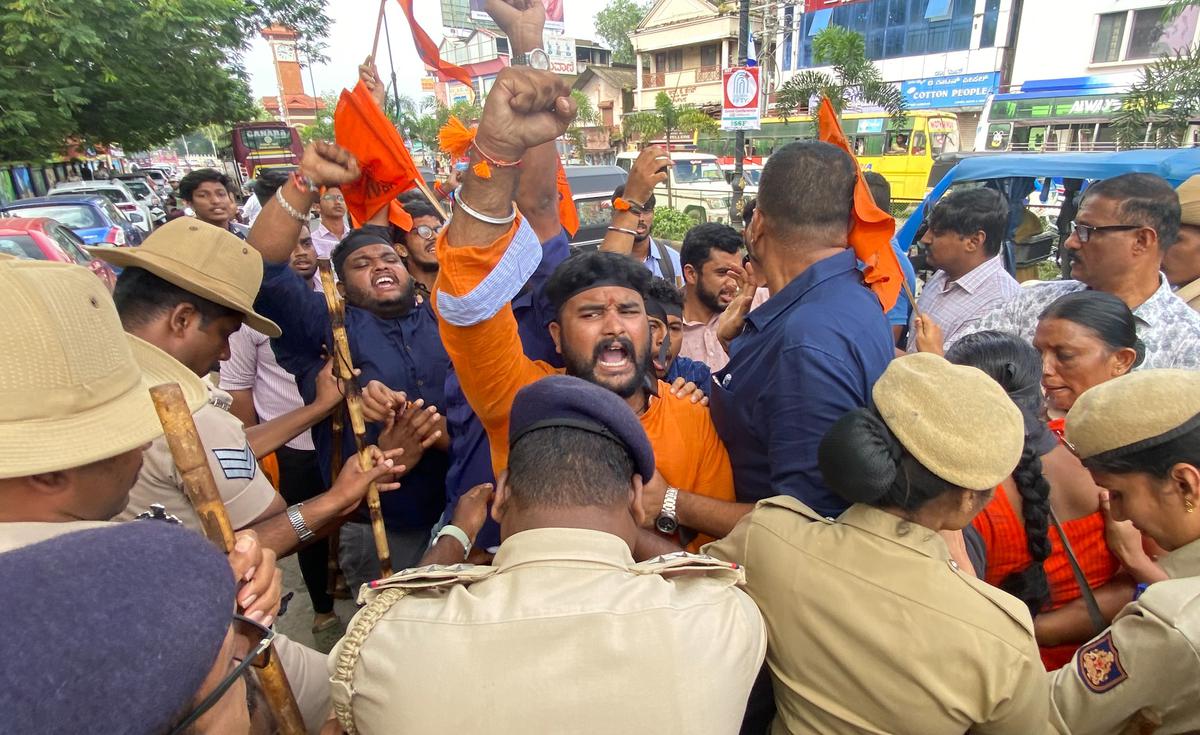 Members of the ABVP staging a protest against Shamsul Islam, former Associate Professor of Political Science, University of Delhi, at University College in Mangaluru on Saturday. 
