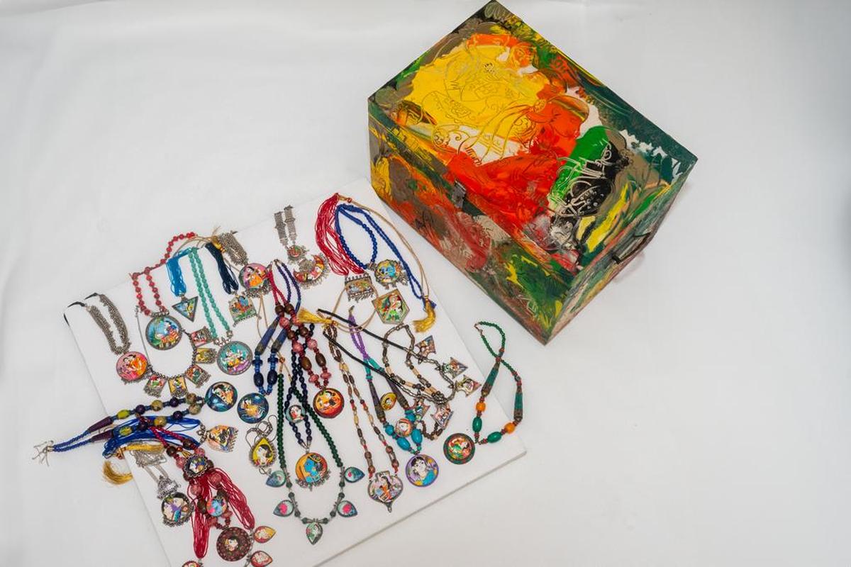 hand-painted pendants and boxes