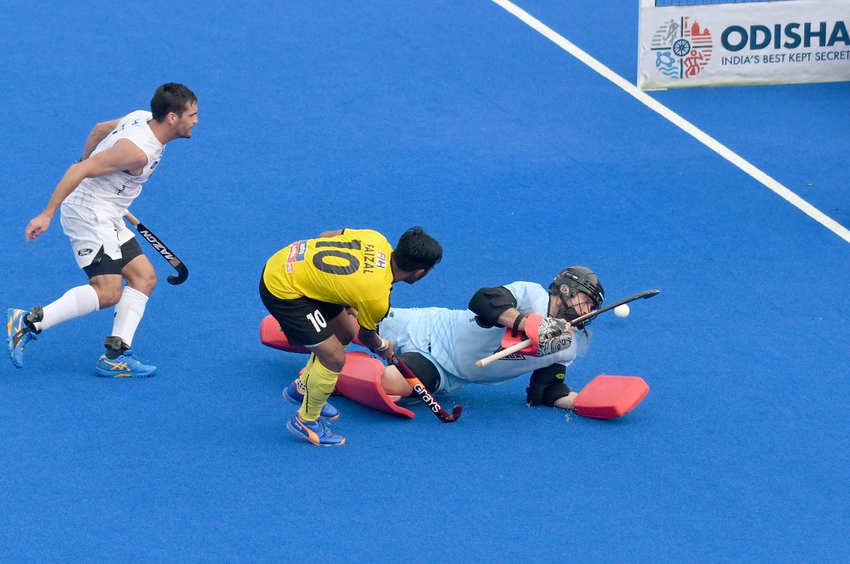Perfectly positioned: Malaysia’s Faizal Saari scores one of his two goals against New Zealand. 