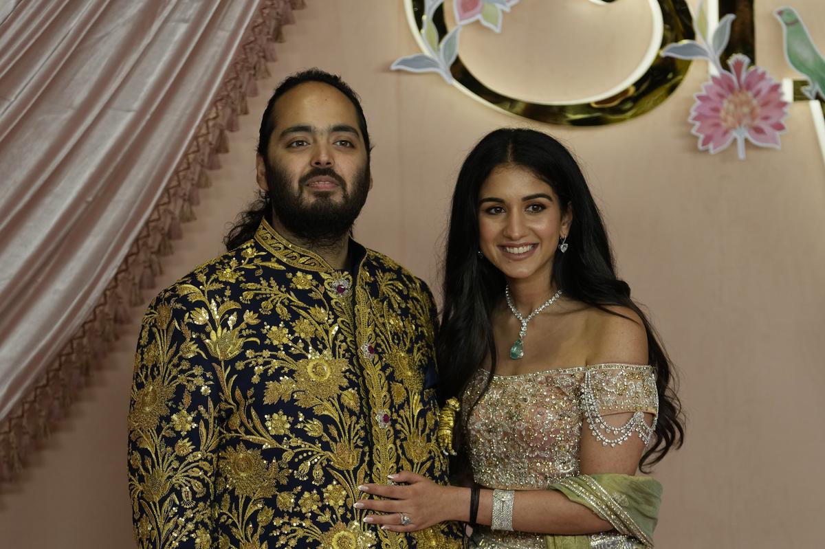 Ambani’s youngest son Anant Ambani and Radhika Merchant pose for a picture during their pre-wedding ceremony in Mumbai, India, Friday, July 5, 2024