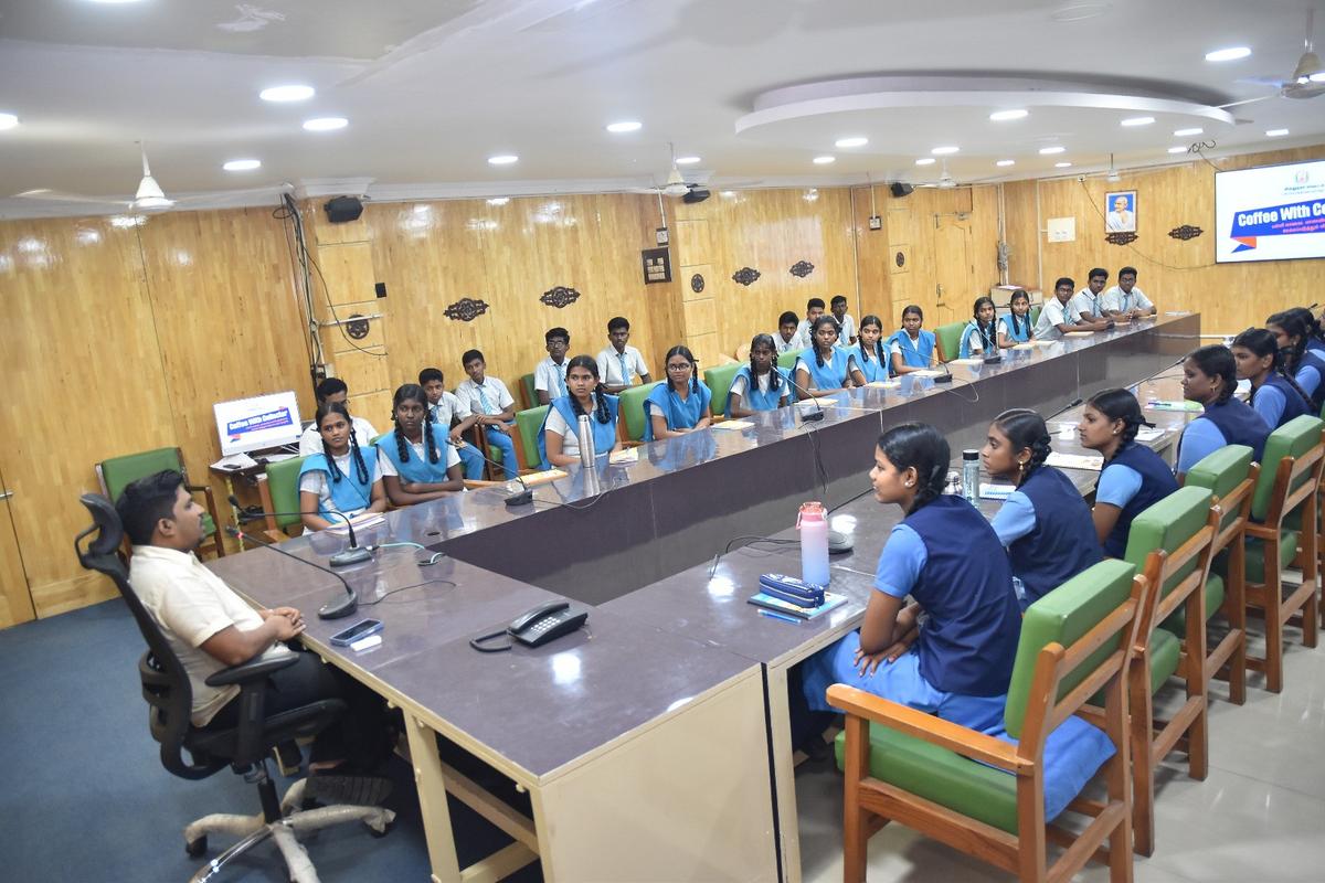 Coffee with Collector programme under way at VSKD Nadar Gurukul Matric Higher Secondary School, Sivakasi.