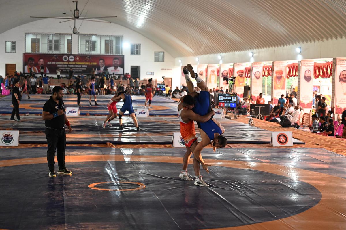 Multiple bouts underway at the Senior Open Ranking Wrestling tournament conducted not in a a stadium but in a lengthy shed, in Nandini Nagar, Gonda, Uttar Pradesh on Sunday,  May 10, 2026.