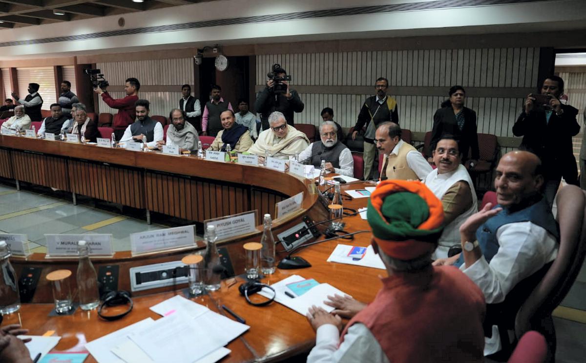 Defence Minister Rajnath Singh with Union Minister for Parliamentary Affairs Pralhad Joshi and other leaders during the all-party meeting, at Parliament House in New Delhi on December 6.