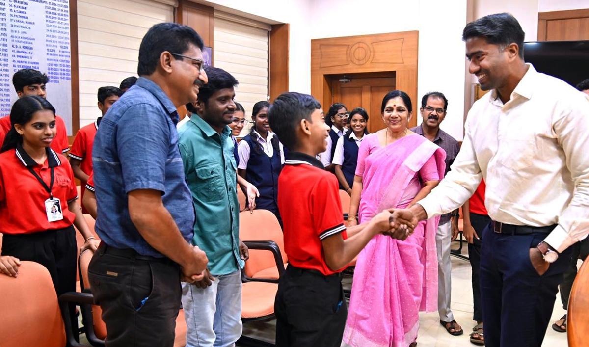 District Collector Arjun Pandian interacts with students at the ‘Meet Your Collector’ programme at Thrissur Collectorate.