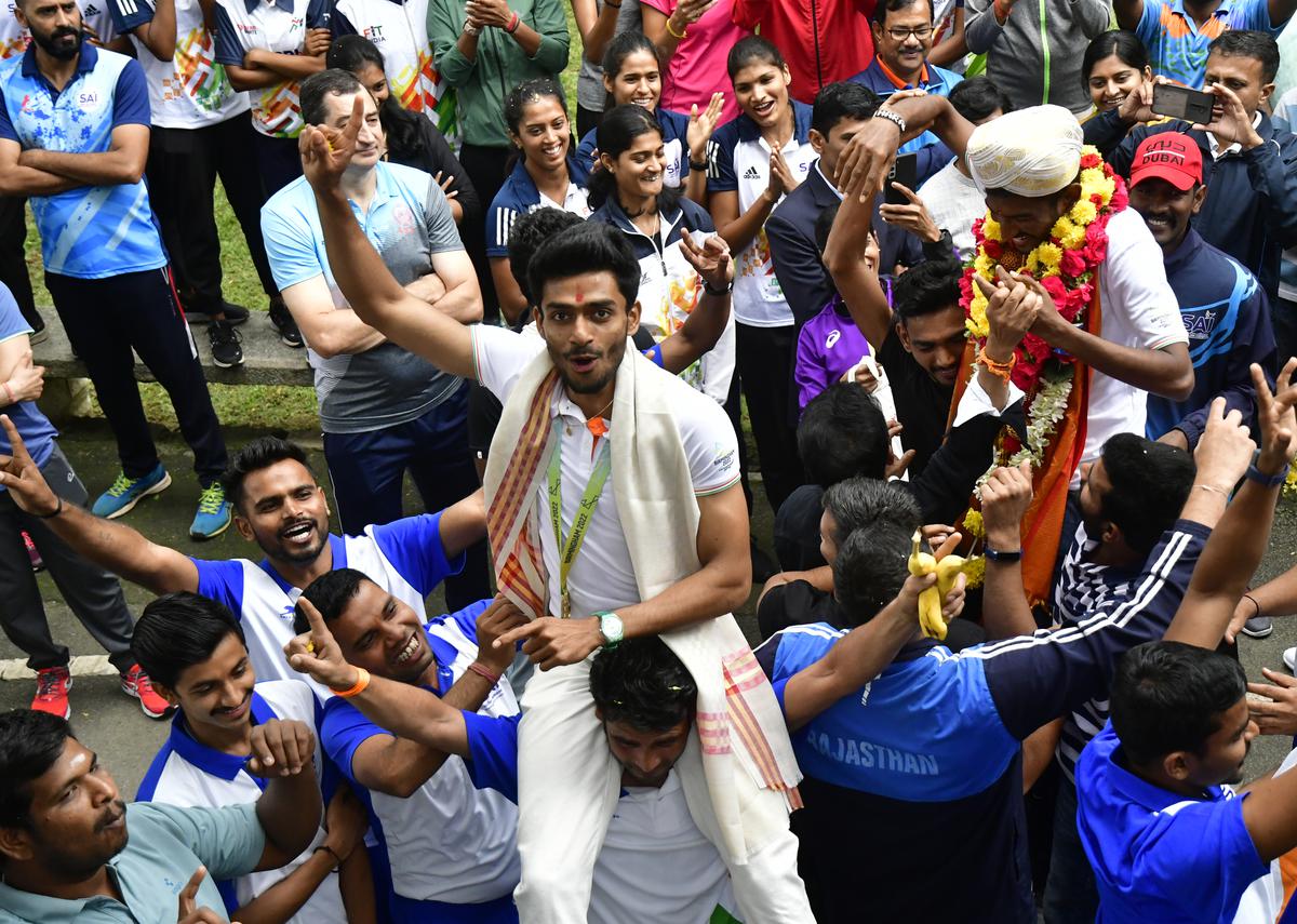CWG 2022 triple jump gold medallist Eldhose Paul, is chaired by ecstatic fans during a welcome ceremony at the SAI (Sports Authority of India), South Centre, in Bengaluru on August 09, 2022.