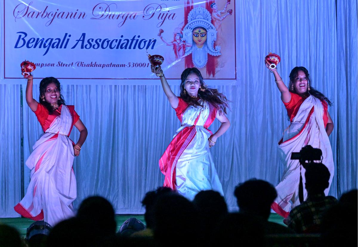 People participating in a cultural programme at Durga Puja celebration by Bengali Association (Thompson Street) being held at at Rani Chandramani Function Hall, Sree Seetaramachandra Swamivari Devasthanam at Jagadamba Junction in Visakhapatnam.