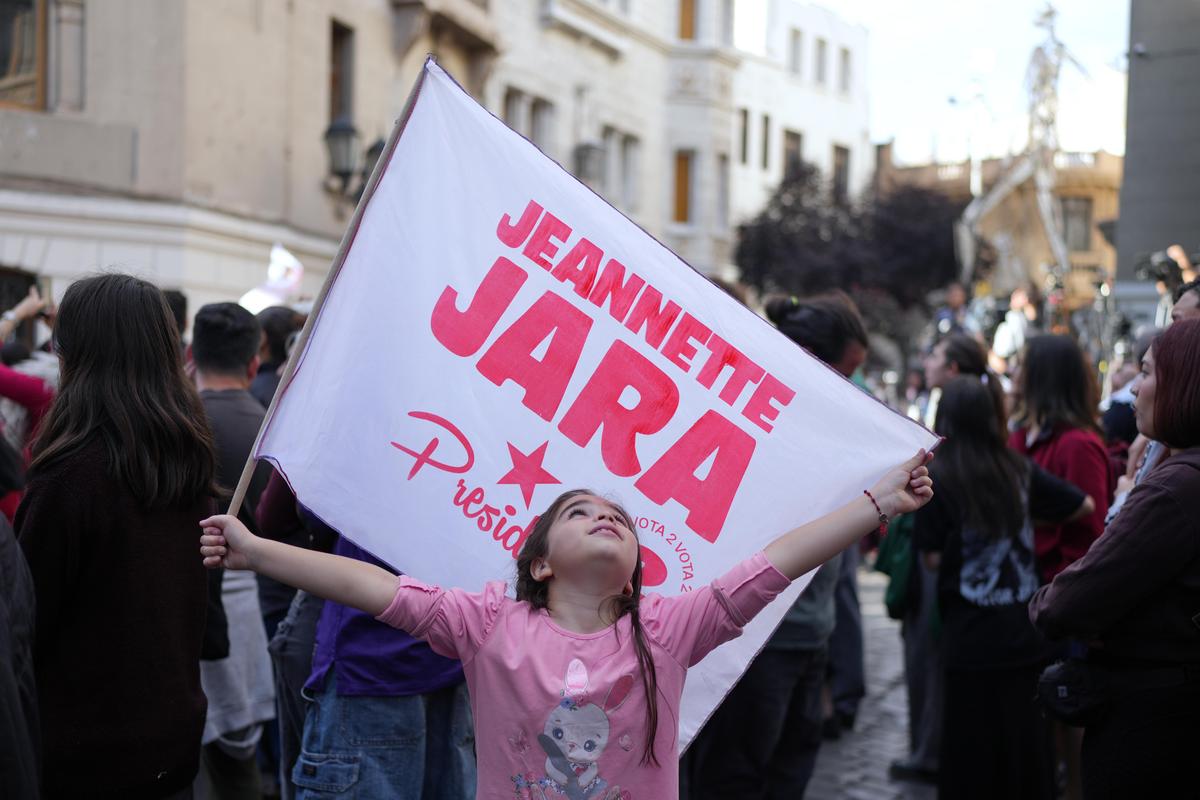 Supporters gather at the campaign headquarters of Jeannette Jara, presidential candidate of the ruling Unity for Chile coalition, after polls closed for the presidential runoff in Santiago, Chile, on Sunday, Dec. 14, 2025.