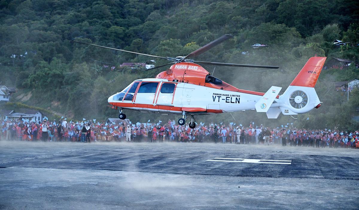 Villagers wait as NSCN (I-M) chief Thuingaleng Muivah arrives in his home village Somdal after 60 years in Ukhrul district of Manipur on Wednesday.