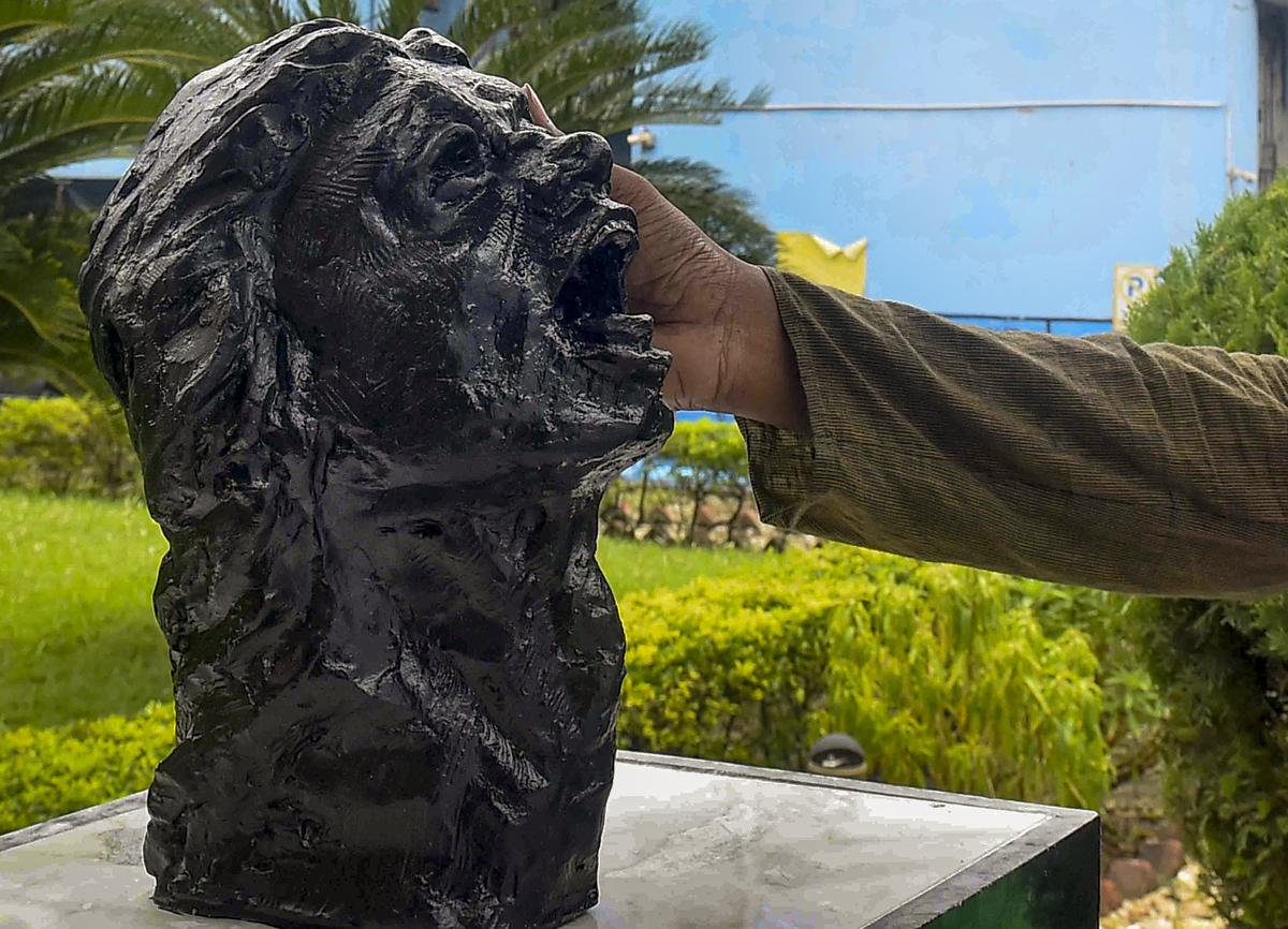 Artist Asit Sanhi gives finishing touches to the symbolic statue of R.G. Kar rape and murder victim ‘Abhaya’ in Kolkata on October 2, 2024. 