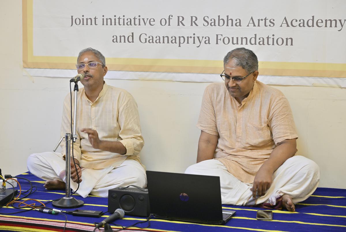  Composer-mridangist K. Arunprakash elaborated how Subramania Pillai had to balance his virtuosity with the music being sung to optimally bring out the best aesthetic experience. Carnatic Vocalist Navaneet Krishnan looks on.  