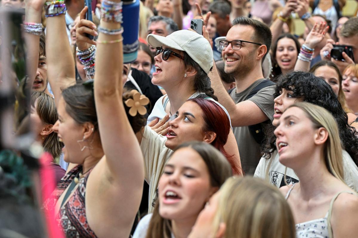 Fans of the singer Taylor Swift gather following the cancellation of three Taylor Swift concerts at Happel stadium after the government confirmed a planned attack at the venue, in Vienna, Austria 