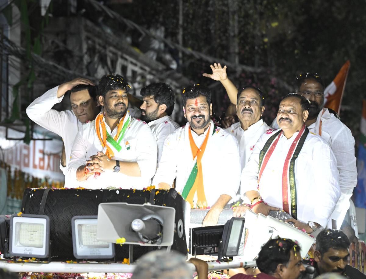 Chief Minister A. Revanth Reddy campaigns alongside Jubilee Hills Congress candidate Naveen Yadav ahead of the upcoming bypoll at Rahmath Nagar in Hyderabad on Friday.