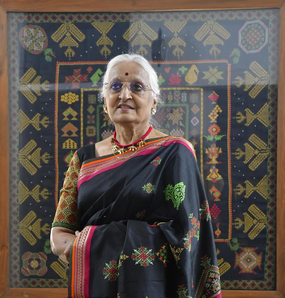 Usha Pawar with her National Award winning work detailing the different kinds of Kasuti embroidery, in Bengaluru on March 05, 2024.