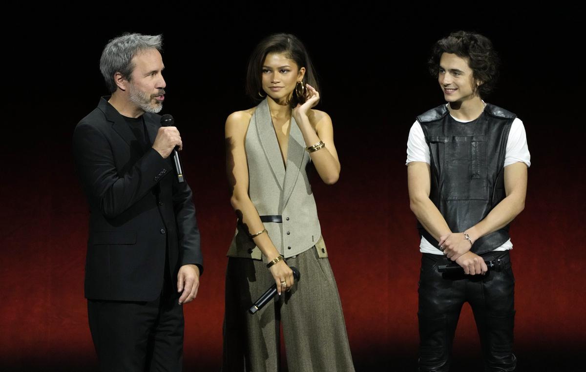 Denis Villeneuve, left, director of the upcoming film ‘Dune: Part Two’, discusses the film with cast members Zendaya, centre, and Timothee Chalamet during the Warner Bros. Pictures presentation at CinemaCon 2023, the official convention of the National Association of Theatre Owners (NATO) at Caesars Palace, Tuesday, April 25, 2023, in Las Vegas. 