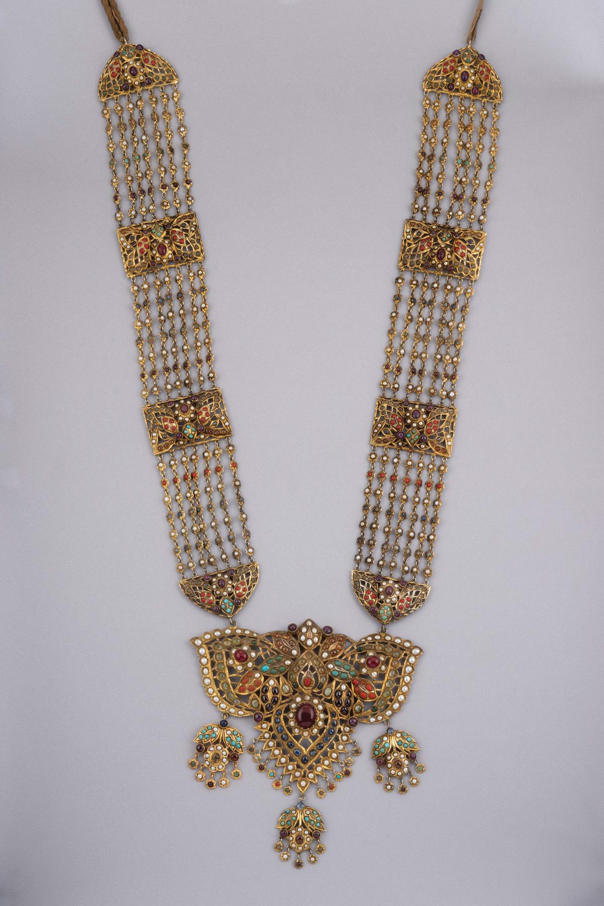 Gold plated silver Navratna necklace exhibited  at the Amrapali Museum in Jaipur. 