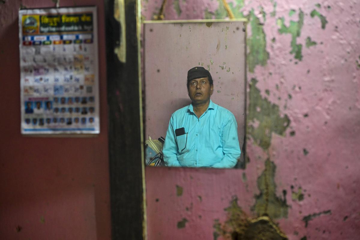 Omprakash Chavan rehearses before the play in Sindhudurg district. 