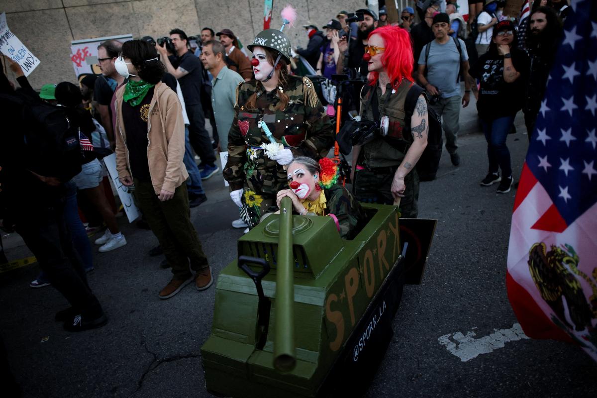 Demonstrators in costume attend a “No Kings” protest against U.S. President Donald Trump’s policies outside City Hall in Los Angeles, California, U.S., on October 18, 2025.