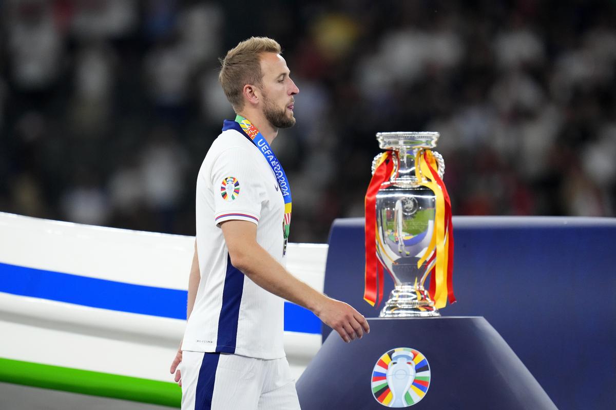 England’s Harry Kane walks past the trophy after the final match between Spain and England at the Euro 2024 tournament in Berlin, Germany, on July 14, 2024. 