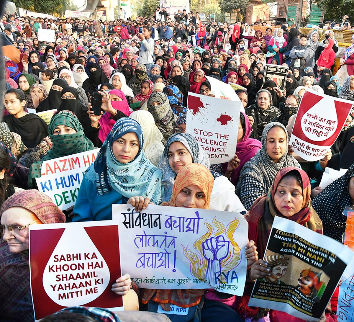 Muslim women protest against CAA and NRC at Jamia Millia Islamia in New Delhi.