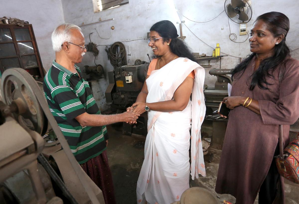 NDA candidate Sunitha Dixon meeting a voter.