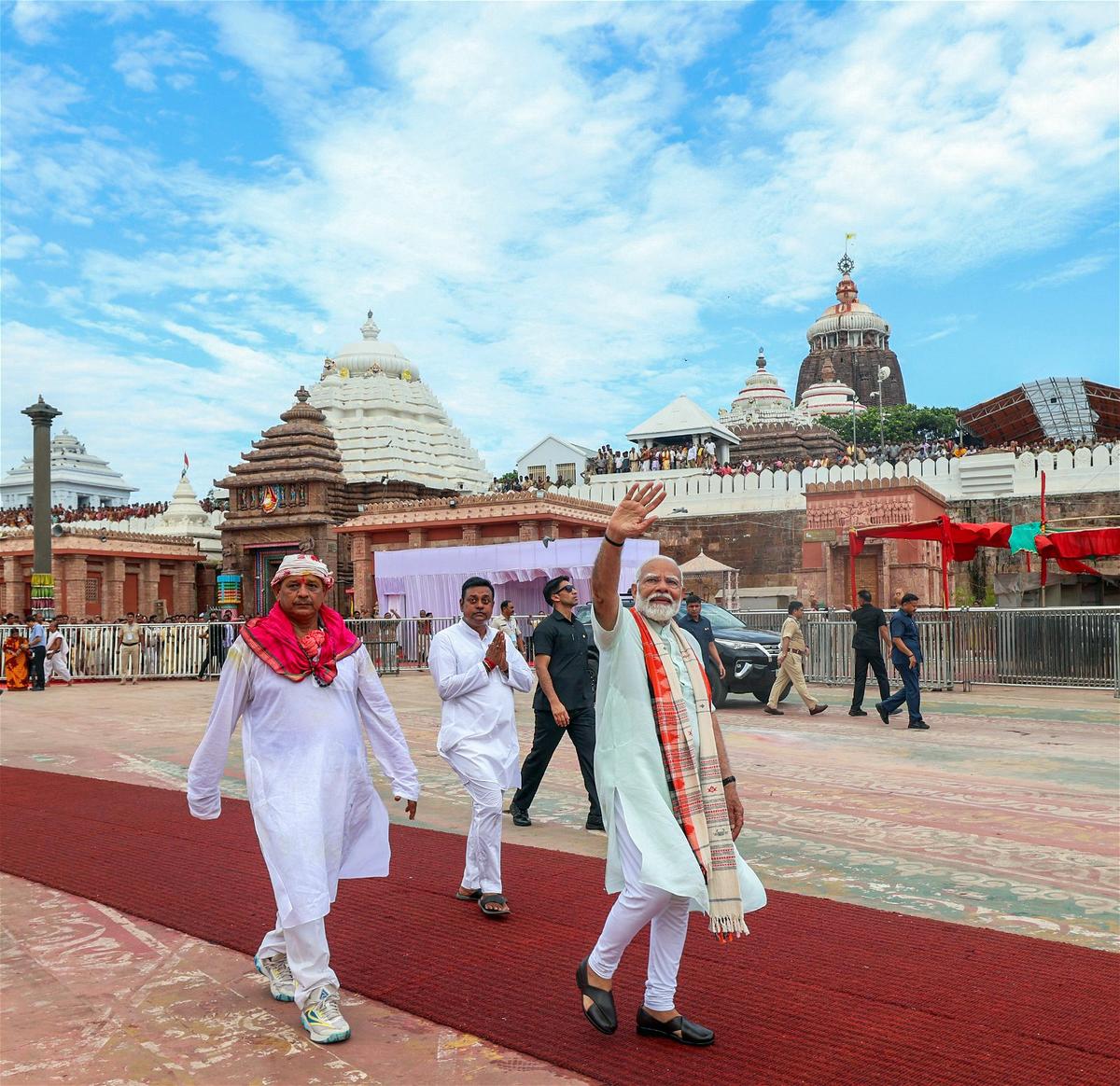 Prime Minister Narendra Modi at Jagannath temple during a roadshow supporting BJP candidate from the Puri constituency, Sambit Patra, for the Lok Sabha polls, in Puri on May 20, 2024,