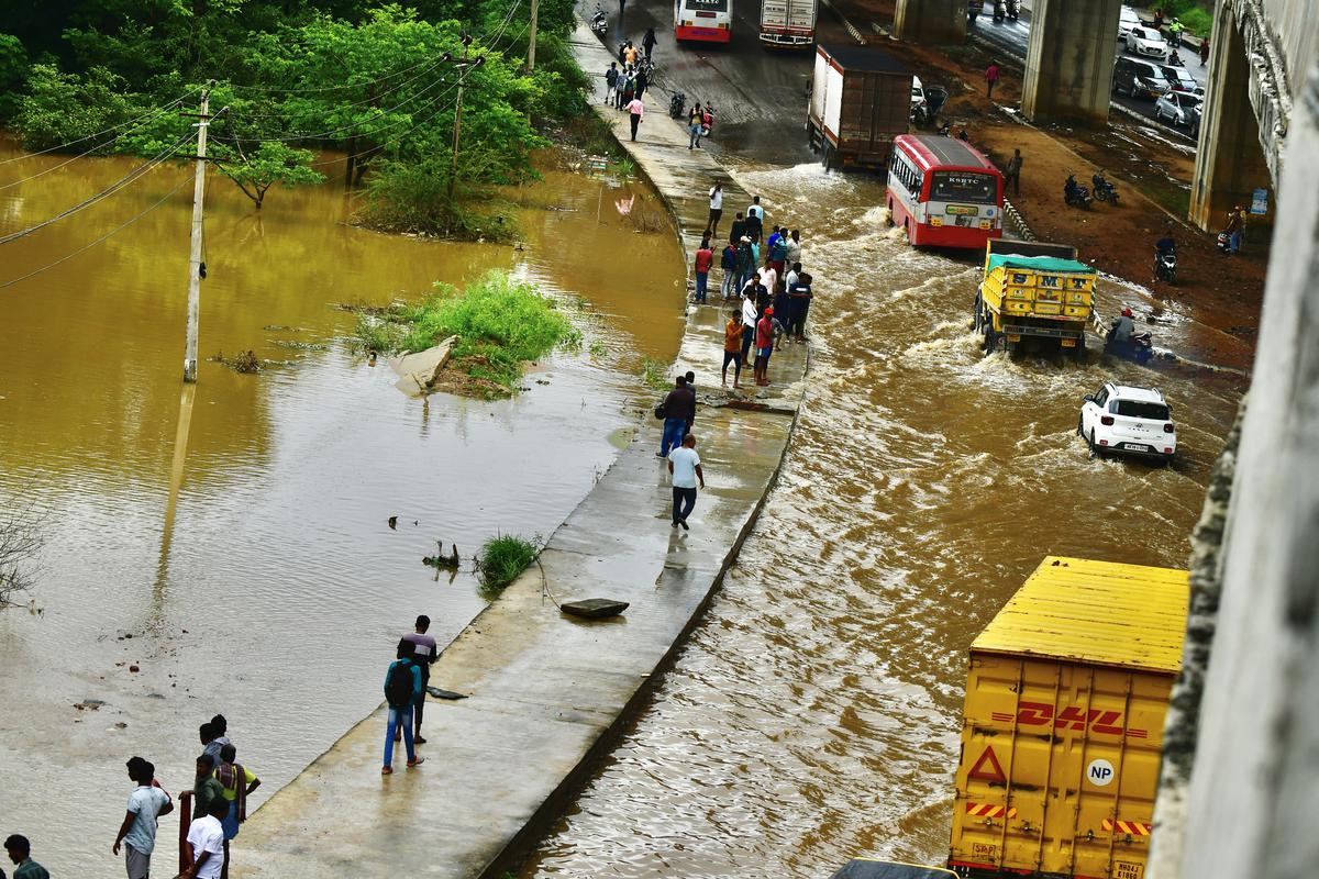 The flooded roads after Kanminike lake breached the banks on August 27.