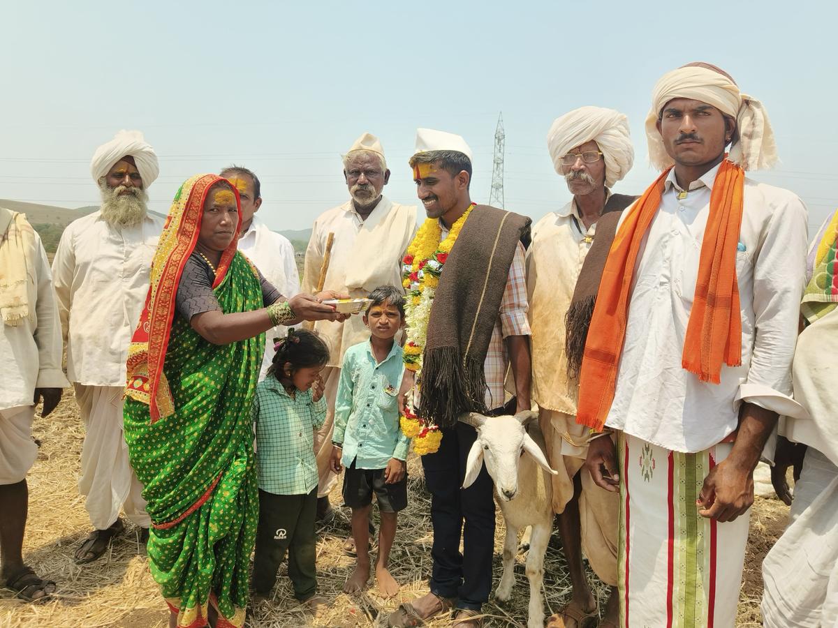 Shepherds from Nanavadi village, Belagarve district, Karnataka celebrate the success of Beerappa Siddappa Doni, a young man from the community who comes from the village of Amuge near Maharashtra. 