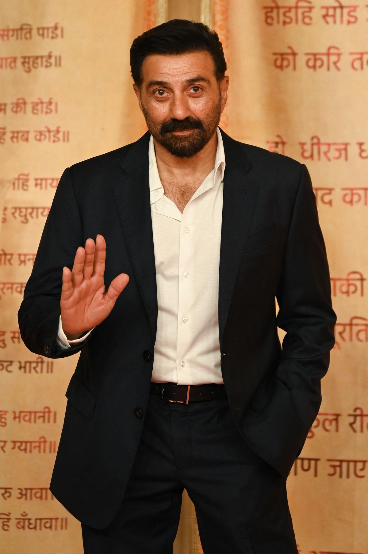 Bollywood actor Sunny Deol poses as he arrives for the wedding reception of billionaire Mukesh Ambani’s son Anant Ambani and Radhika Merchant in Mumbai on July 14, 2024