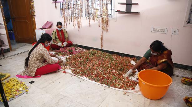 Discarded flowers from a temple add fragrance to an initiative 