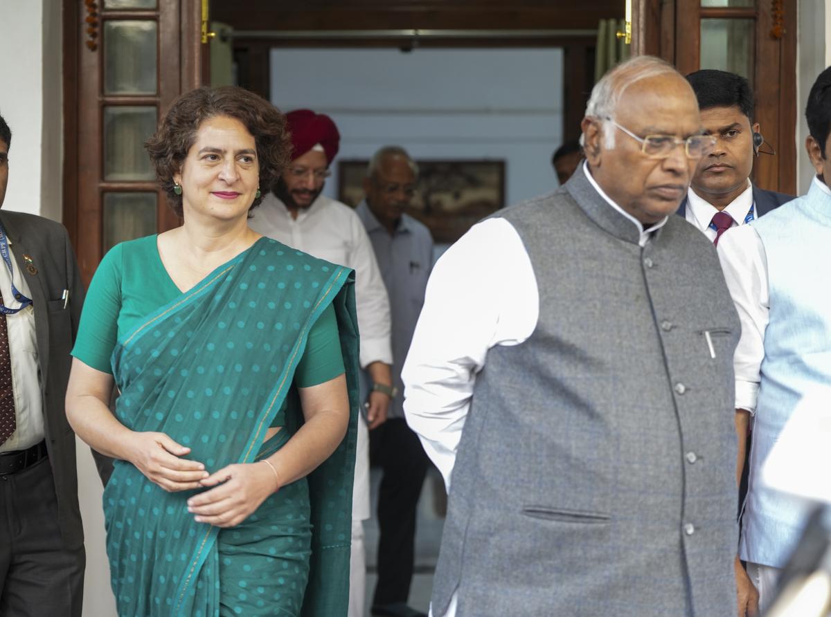 Congress General Secretary Priyanka Gandhi Vadra with party President Mallikarjun Kharge following her massive victory in the Wayanad Lok Saha bypoll, in New Delhi. 