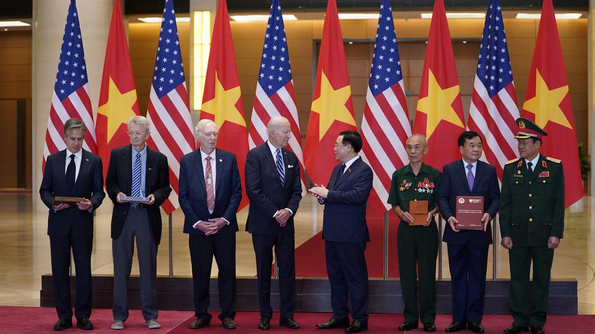 Biden wraps Vietnam visit by talking with business leaders and visiting a memorial to John McCain