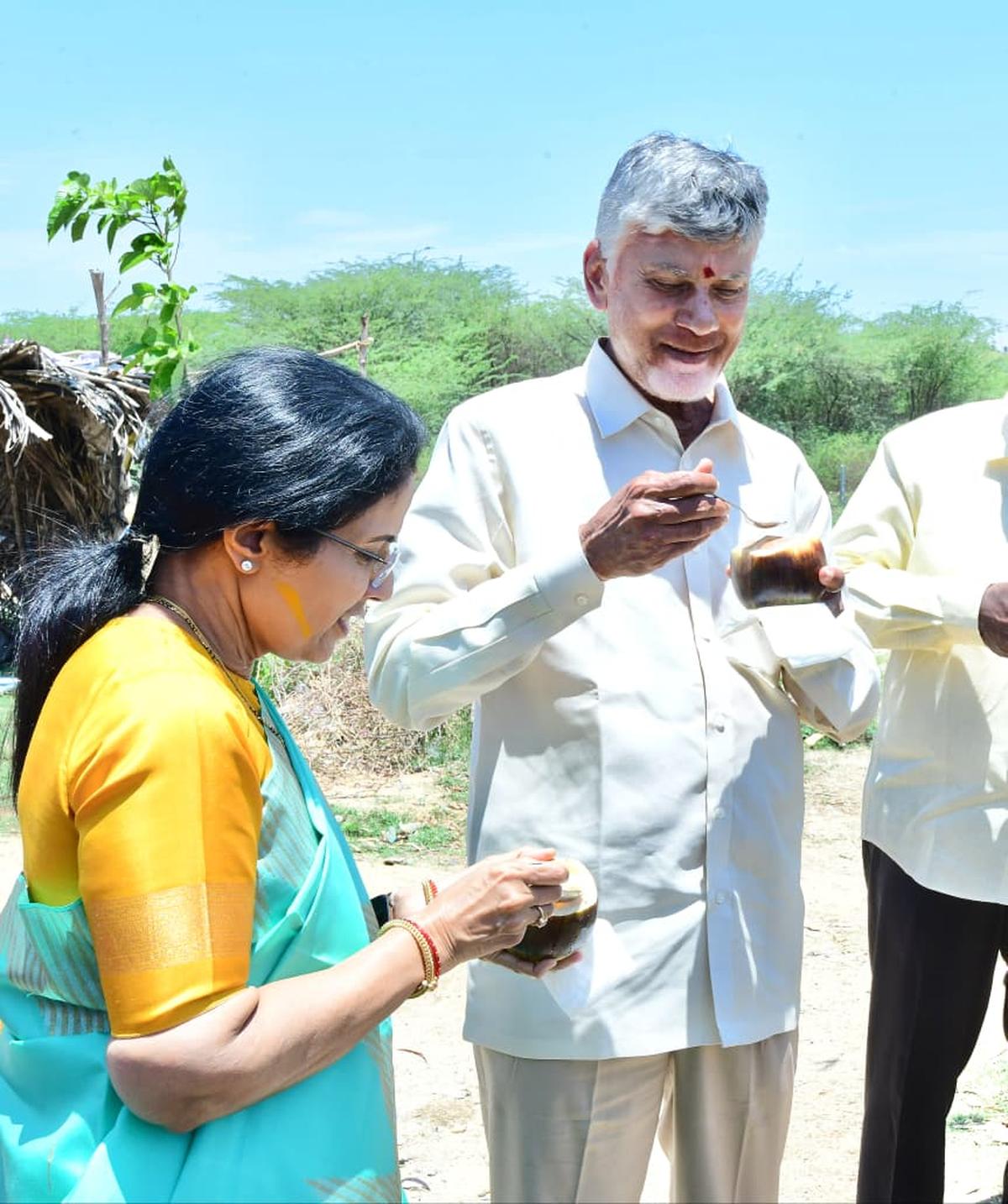 Chief Minister N. Chandrababu Naidu and his wife Nara Bhuvaneswari eating thati munjalu (ice apples) at a roadside near Kuppam in Chittoor district on Wednesday. X/@ncbn Chief Minister N. Chandrababu Naidu and his wife Nara Bhuvaneswari eating thati munjalu (ice apples) at a roadside near Kuppam in Chittoor district on Wednesday. X/@ncbn